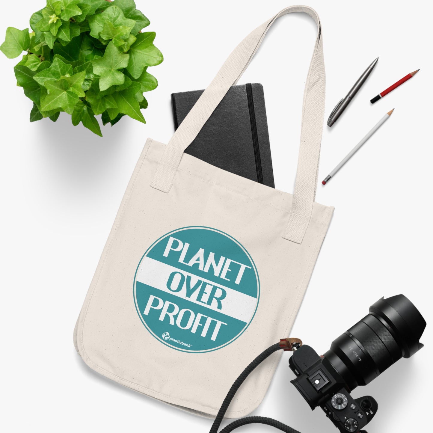 Planet Over Profit Tote Bag
